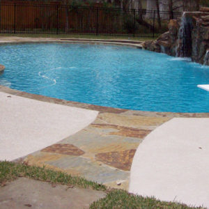 flagstone inlay swimming pool decking