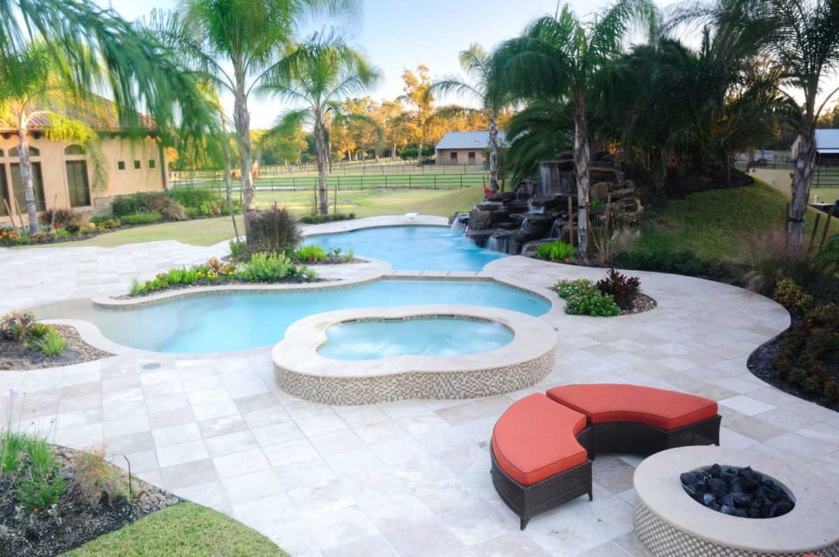 Custom Built Pool with beach entry and spa in Humble, TX