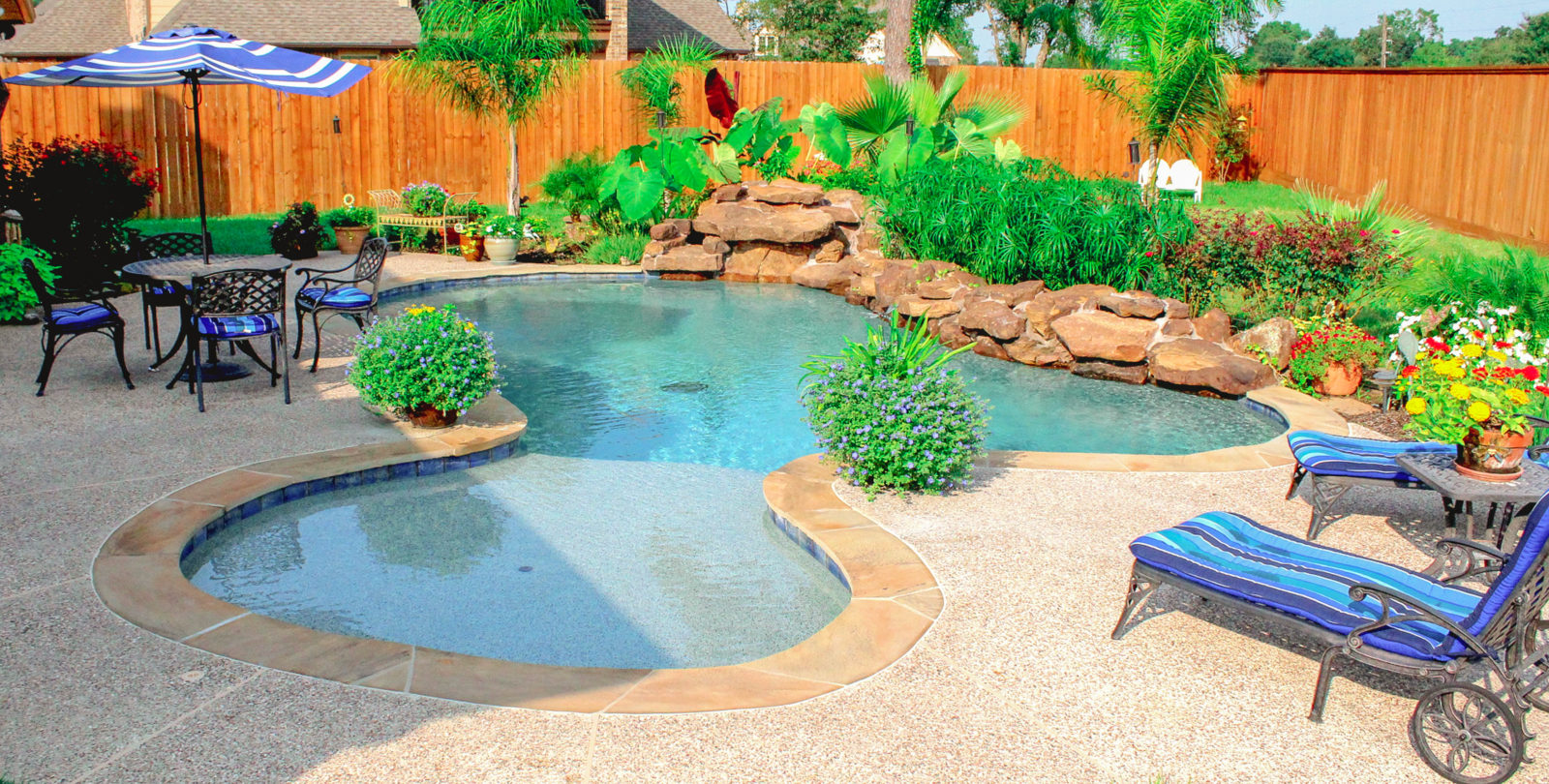 Custom Swimming Pool With Outdoor Lounge Chairs